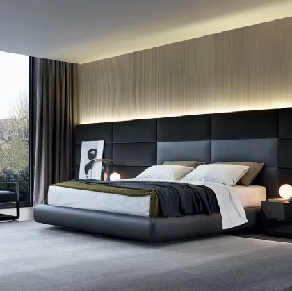 Leather upholstered bed with leather and velvet Dream headboard by Poliform.