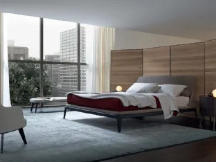Nabuk leather woven bed with an oak base and Poliform Kelly headboard.