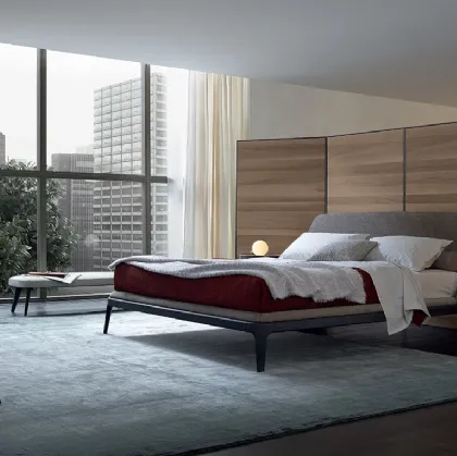 Nabuk leather woven bed with an oak base and Poliform Kelly headboard.