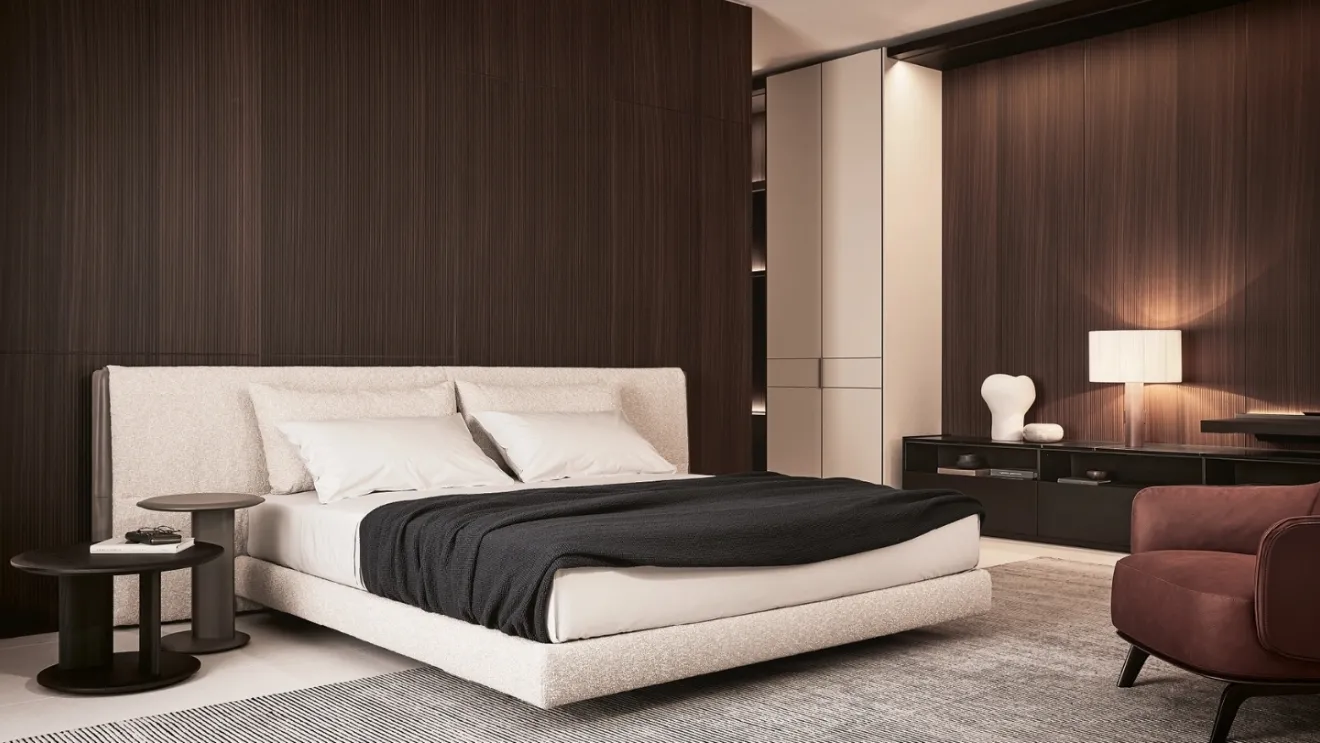Fabric bed with Yume headboard by Poliform.