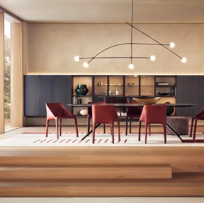 Suspended mobile shelving unit in bronzed lacquered metal by Poliform.