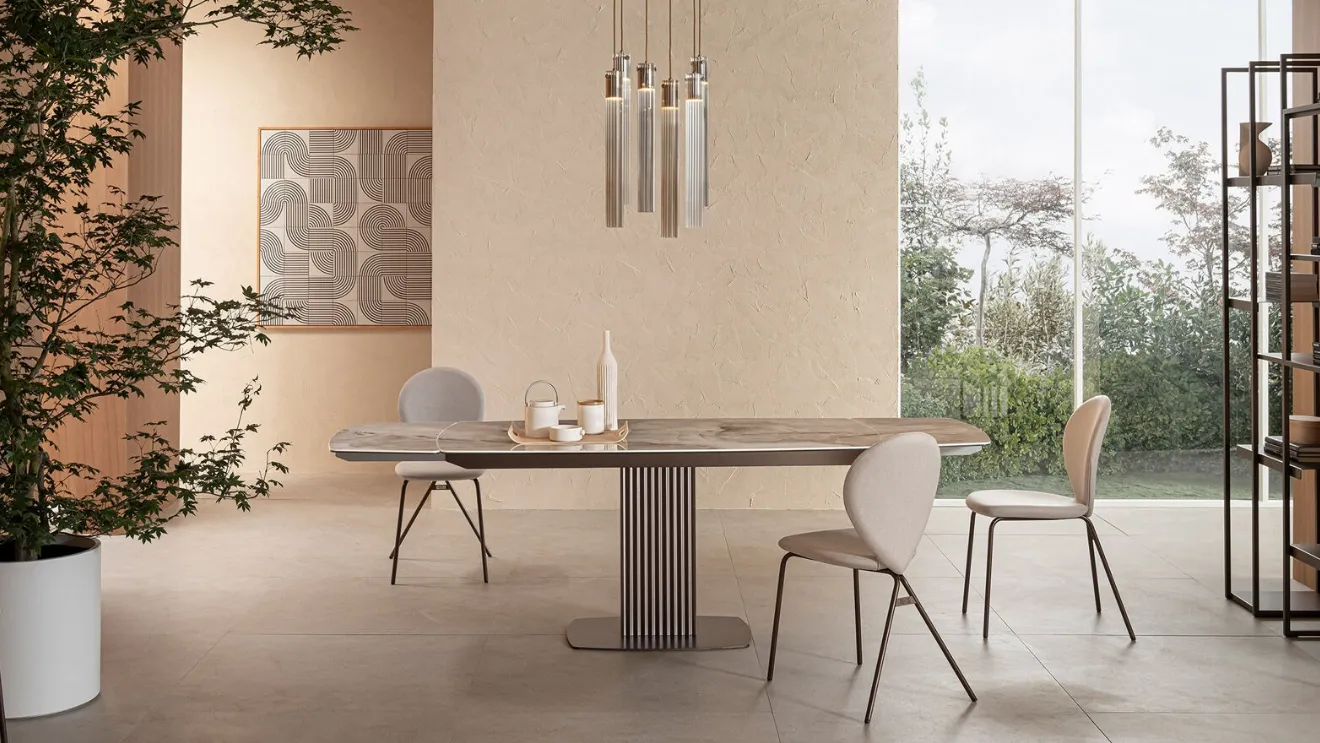 Extendable design table Onda by Riflessi.