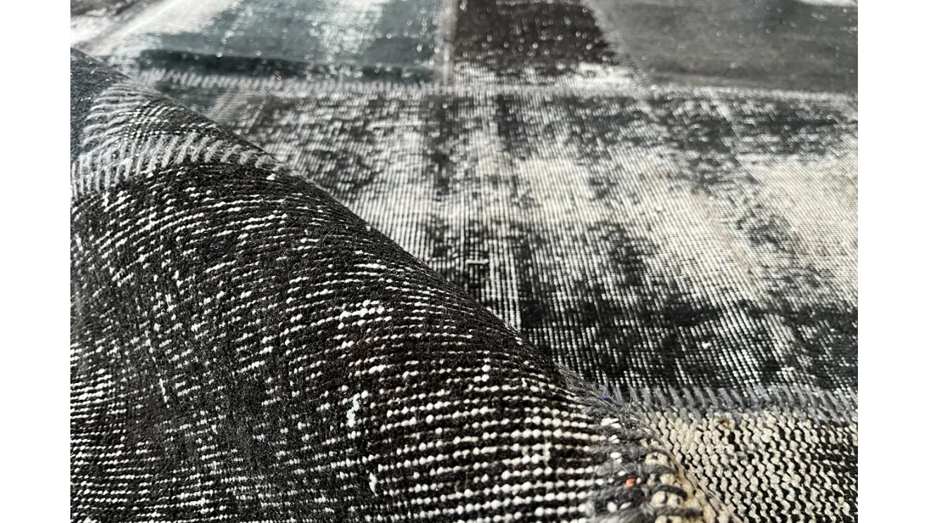 Patchwork Black Wool and Cotton Rug by Carpet Edition.