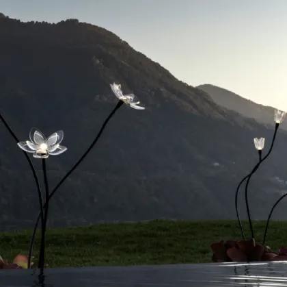 Outdoor Blum Flower metal and PVC lamp by Linea Light.
