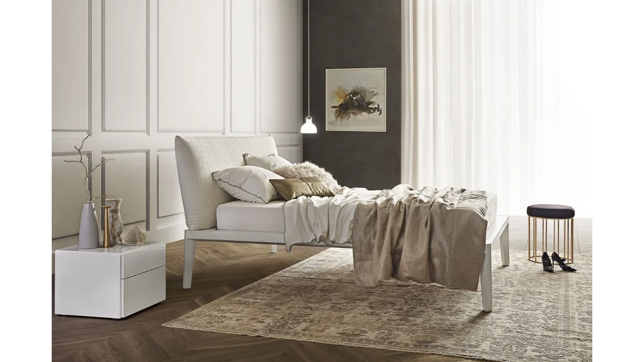 White Andrea Rovere bed by Olivieri with headboard.
