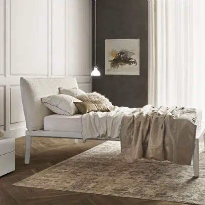 White Andrea Rovere bed by Olivieri with headboard.