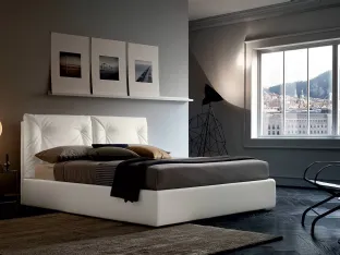 Leather bed with Edgar headboard by Felis.