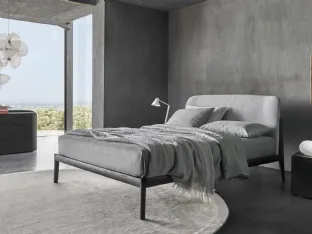 Sissi bed with upholstered fabric headboard by Sangiacomo.