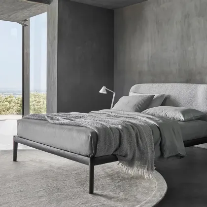 Sissi bed with upholstered fabric headboard by Sangiacomo.