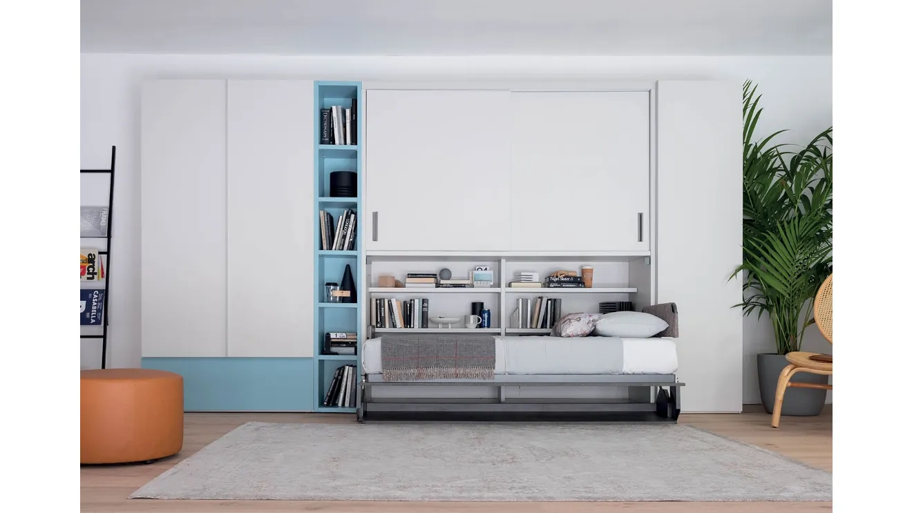 Single pull-out bed open with integrated desk in matte lacquered Hiro wardrobe by Clever.