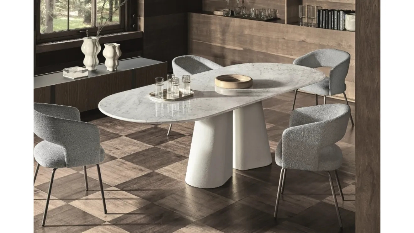 Oval Pillar table in marble and cement by Ditre Italia.