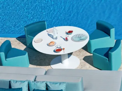 Outdoor design table in ceramic with Big In&Out armchairs by Varaschin