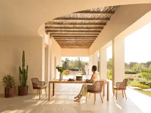 Iroko Gianna table by Varaschin.